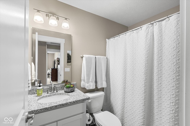 14442 Treasure Creek Ln, Fishers, IN 46038 - full bathroom featuring vanity, a textured ceiling, and a shower with shower curtain
