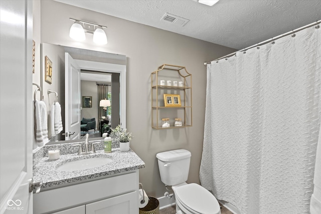14442 Treasure Creek Ln, Fishers, IN 46038 - bathroom featuring vanity, a textured ceiling, and a shower with shower curtain
