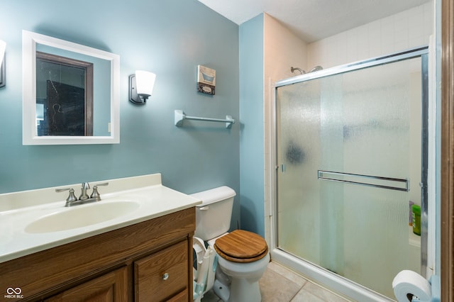 8306 Corkwood Dr, Indianapolis, IN 46227 - full bathroom with a shower stall, vanity, and tile patterned flooring