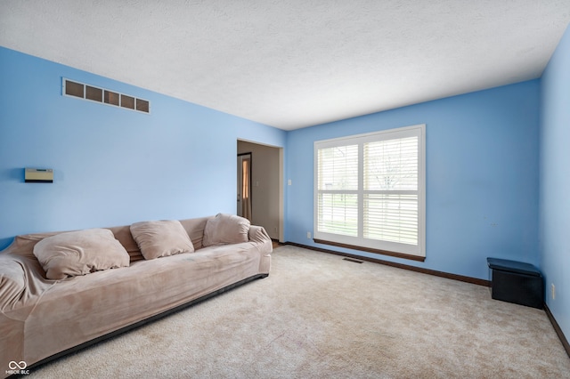 8306 Corkwood Dr, Indianapolis, IN 46227 - living room featuring baseboards and carpet