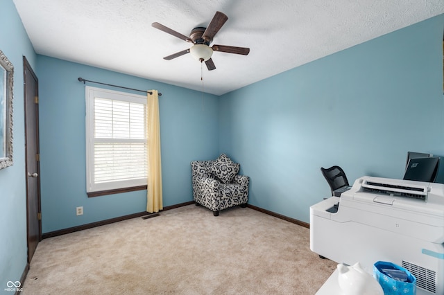 8306 Corkwood Dr, Indianapolis, IN 46227 - carpeted home office featuring ceiling fan and a textured ceiling
