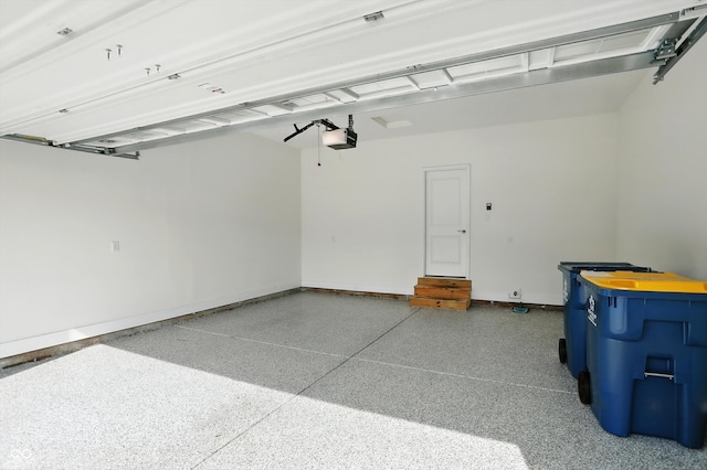 14474 Treasure Creek Ln, Fishers, IN 46038 - garage featuring a garage door opener and baseboards