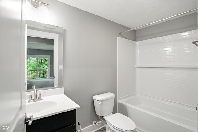 14474 Treasure Creek Ln, Fishers, IN 46038 - bathroom with vanity, washtub / shower combination, and a textured ceiling