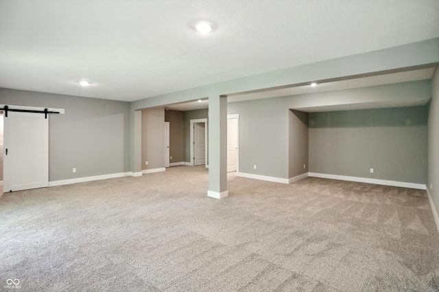 14474 Treasure Creek Ln, Fishers, IN 46038 - finished below grade area with carpet, a barn door, and recessed lighting