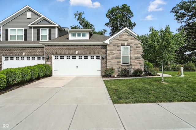 14474 Treasure Creek Ln, Fishers, IN 46038 - view of front facade featuring concrete driveway, a front yard, roof with shingles, and an attached garage