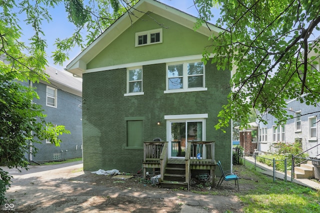 3307 N College Ave, Indianapolis, IN 46205 - rear view of property with brick siding and a wooden deck