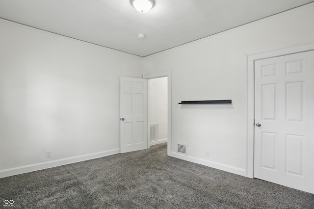 3307 N College Ave, Indianapolis, IN 46205 - unfurnished bedroom with carpet flooring and baseboards
