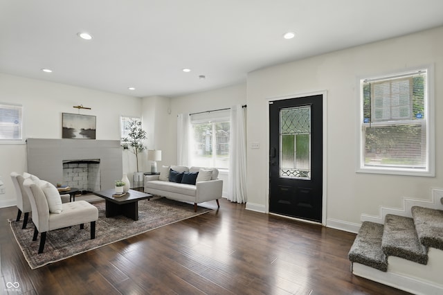 3307 N College Ave, Indianapolis, IN 46205 - living room featuring a fireplace, dark wood-type flooring, recessed lighting, and stairway