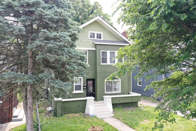 3307 N College Ave, Indianapolis, IN 46205 - view of front of property featuring stucco siding and a chimney