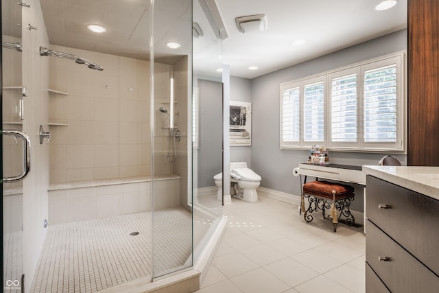 8651 Emerald Ln, Indianapolis, IN 46260 - bathroom featuring a stall shower, vanity, tile patterned floors, and recessed lighting