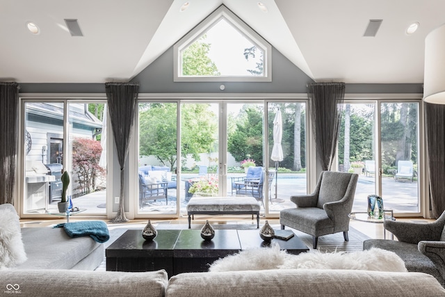 8651 Emerald Ln, Indianapolis, IN 46260 - living area with vaulted ceiling and healthy amount of natural light