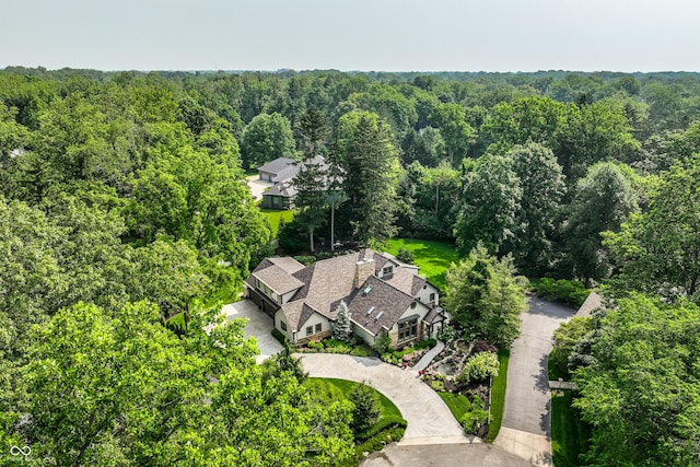 8651 Emerald Ln, Indianapolis, IN 46260 - aerial view of property and surrounding area with a forest