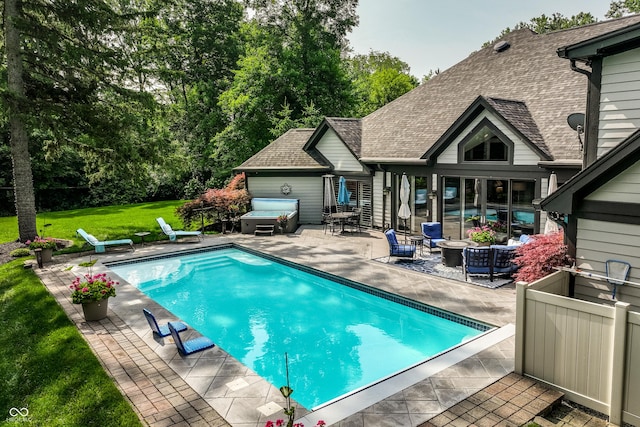 8651 Emerald Ln, Indianapolis, IN 46260 - swimming pool with a patio area and a lawn