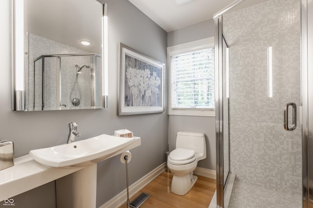8651 Emerald Ln, Indianapolis, IN 46260 - full bath featuring wood finished floors and a shower stall