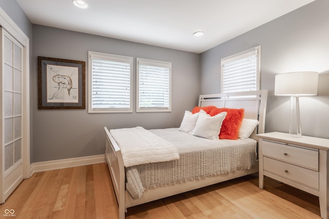 8651 Emerald Ln, Indianapolis, IN 46260 - bedroom with light wood finished floors and recessed lighting