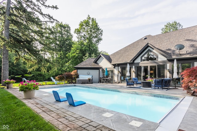8651 Emerald Ln, Indianapolis, IN 46260 - outdoor pool featuring a patio and a hot tub