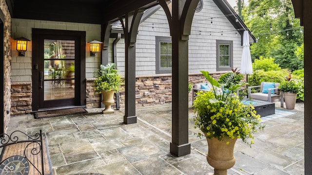 8651 Emerald Ln, Indianapolis, IN 46260 - entrance to property with stone siding