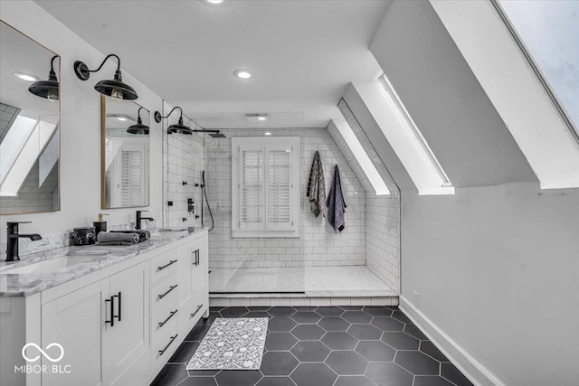 4732 N Kenwood Ave, Indianapolis, IN 46208 - bathroom featuring walk in shower, tile patterned floors, double vanity, and recessed lighting