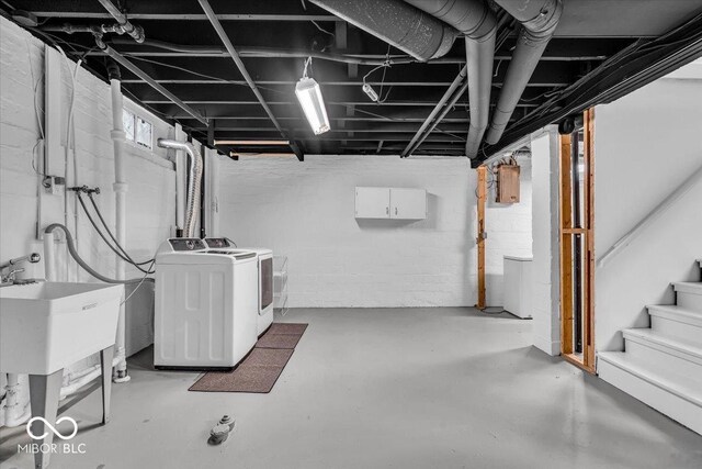 4732 N Kenwood Ave, Indianapolis, IN 46208 - basement featuring washing machine and dryer and stairway