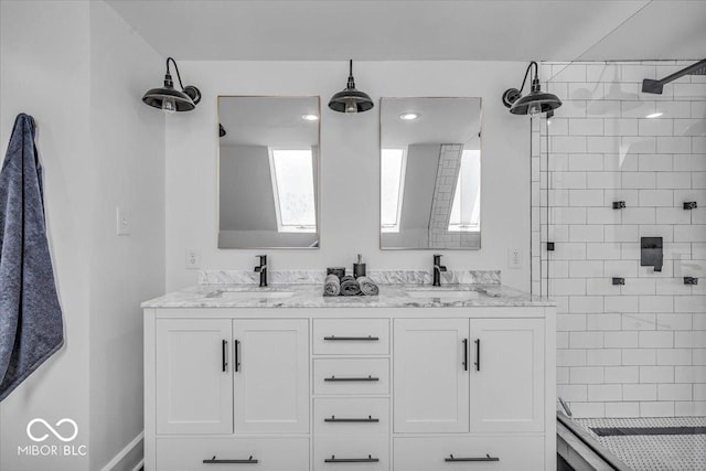 4732 N Kenwood Ave, Indianapolis, IN 46208 - full bathroom featuring a stall shower and double vanity