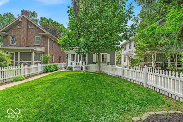 4732 N Kenwood Ave, Indianapolis, IN 46208 - fenced yard with a sunroom