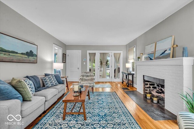 4732 N Kenwood Ave, Indianapolis, IN 46208 - living area featuring wood finished floors and a fireplace