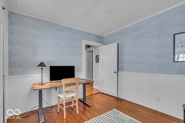 4732 N Kenwood Ave, Indianapolis, IN 46208 - office featuring wainscoting, wood finished floors, and wallpapered walls