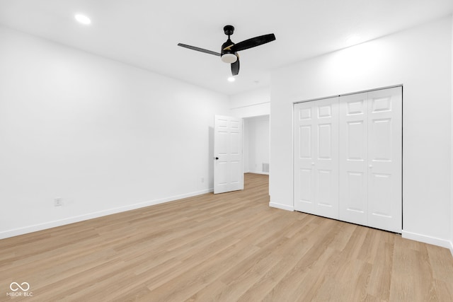 2031 Central Ave, Indianapolis, IN 46202 - unfurnished bedroom featuring light wood-type flooring, recessed lighting, a closet, and a ceiling fan