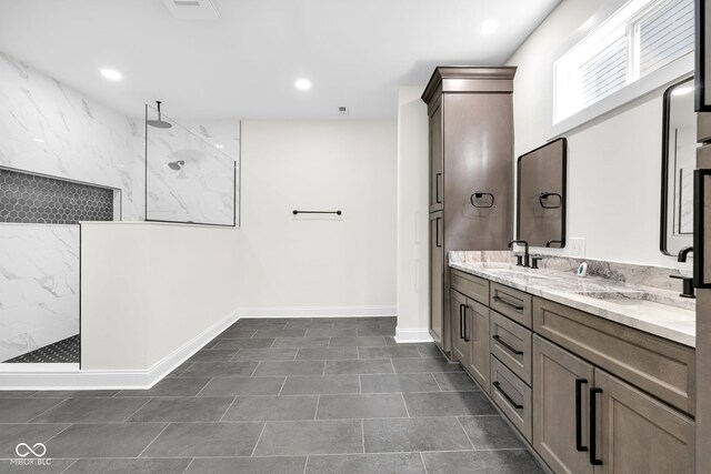 2031 Central Ave, Indianapolis, IN 46202 - bathroom featuring double vanity, a marble finish shower, and recessed lighting
