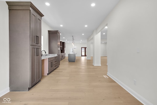 2031 Central Ave, Indianapolis, IN 46202 - hallway featuring light wood-type flooring and recessed lighting