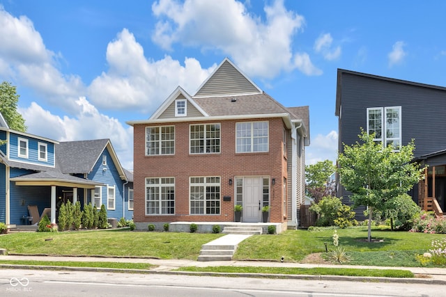 2031 Central Ave, Indianapolis, IN 46202 - colonial home with a front lawn and brick siding