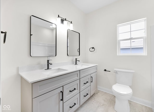 2031 Central Ave, Indianapolis, IN 46202 - bathroom with double vanity and marble look tile flooring