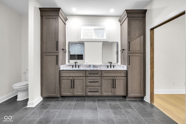 2031 Central Ave, Indianapolis, IN 46202 - full bath featuring double vanity, recessed lighting, and tile patterned flooring