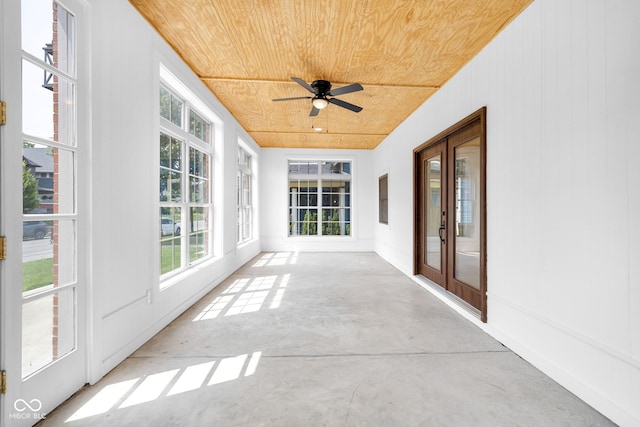 2031 Central Ave, Indianapolis, IN 46202 - unfurnished sunroom with wooden ceiling, healthy amount of natural light, french doors, and concrete floors