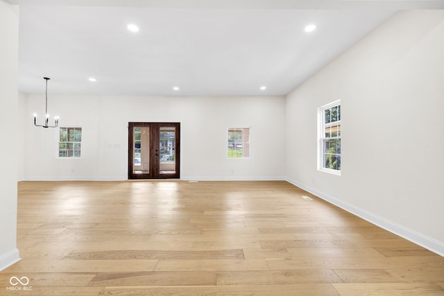 2031 Central Ave, Indianapolis, IN 46202 - unfurnished room featuring a chandelier, healthy amount of natural light, light wood-style flooring, and recessed lighting