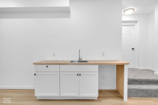 2031 Central Ave, Indianapolis, IN 46202 - bar featuring a sink and light wood-style flooring