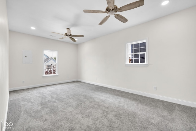 2031 Central Ave, Indianapolis, IN 46202 - carpeted spare room with electric panel, ceiling fan, and recessed lighting
