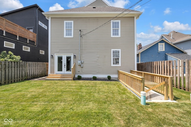 2031 Central Ave, Indianapolis, IN 46202 - back of house featuring french doors, a fenced backyard, and entry steps