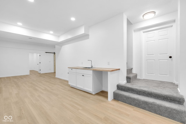 2031 Central Ave, Indianapolis, IN 46202 - bar with stairs, light wood finished floors, recessed lighting, and a barn door