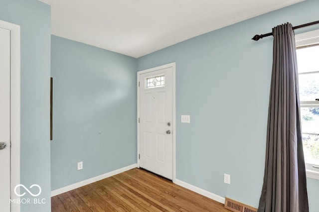 3630 E Morningside Dr, Bloomington, IN 47408 - foyer featuring wood finished floors and baseboards
