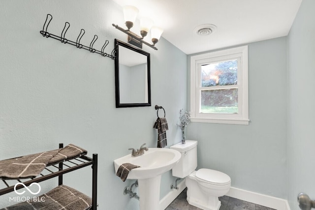 3630 E Morningside Dr, Bloomington, IN 47408 - bathroom featuring toilet and baseboards