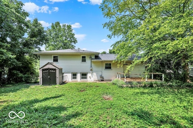 3630 E Morningside Dr, Bloomington, IN 47408 - back of property featuring a storage unit and a lawn