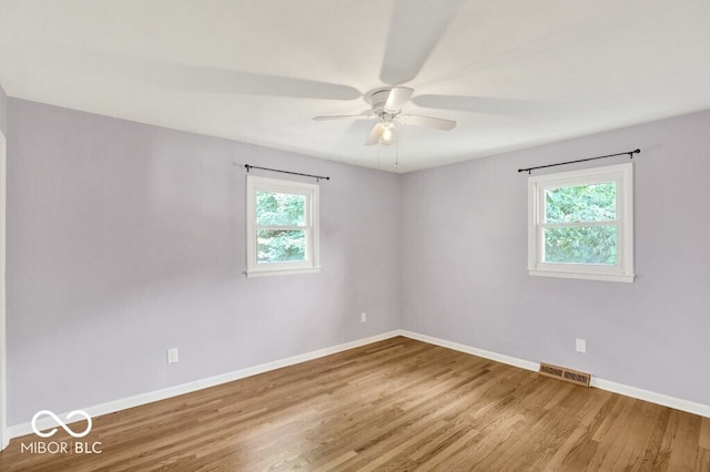 3630 E Morningside Dr, Bloomington, IN 47408 - unfurnished room featuring wood finished floors and ceiling fan