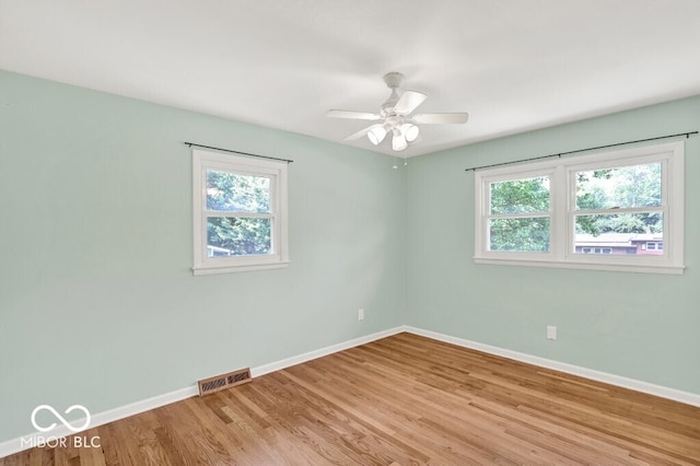 3630 E Morningside Dr, Bloomington, IN 47408 - spare room with light wood-style flooring and a ceiling fan