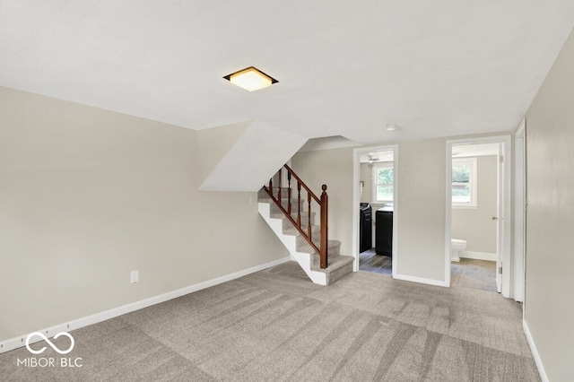 3630 E Morningside Dr, Bloomington, IN 47408 - basement with stairway, carpet, and a ceiling fan