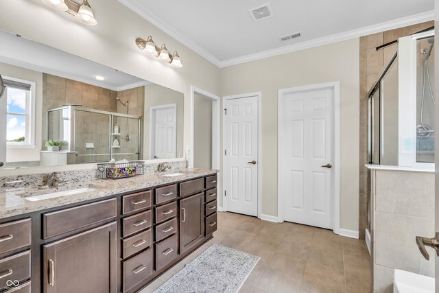 9231 E Poynter Dr, Morgantown, IN 46160 - bathroom featuring a stall shower, double vanity, ornamental molding, and tile patterned flooring