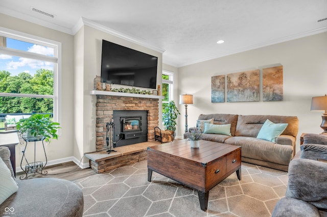 9231 E Poynter Dr, Morgantown, IN 46160 - living room with crown molding, wood finished floors, recessed lighting, and a wood stove