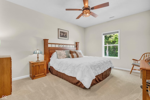 9231 E Poynter Dr, Morgantown, IN 46160 - bedroom with light carpet and a ceiling fan