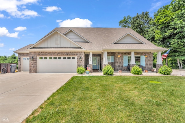 9231 E Poynter Dr, Morgantown, IN 46160 - craftsman-style house featuring an attached garage, brick siding, a front yard, driveway, and a shingled roof