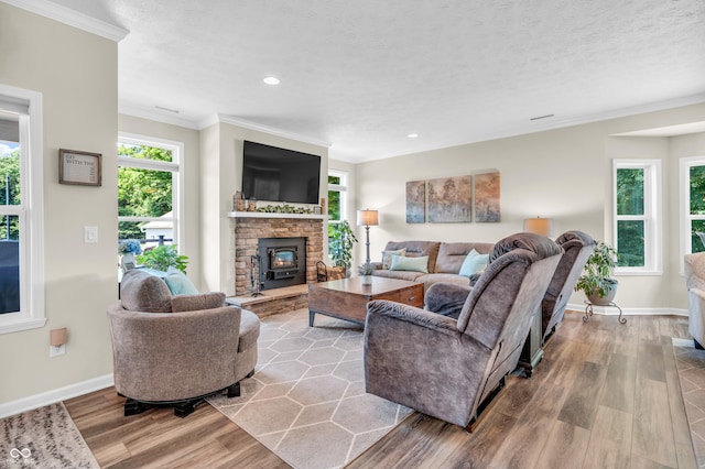 9231 E Poynter Dr, Morgantown, IN 46160 - living room featuring wood finished floors, recessed lighting, and crown molding